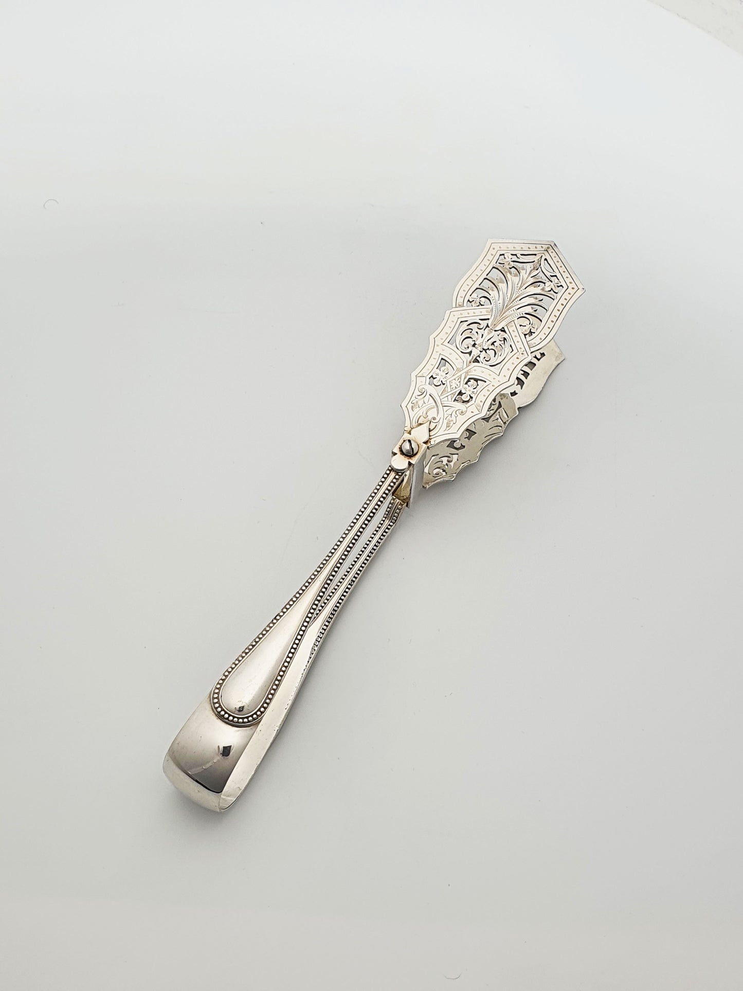 Gorgeous Antique Silver-Plated Serving Tongs with Ornate Pierced Ends – circa 1905