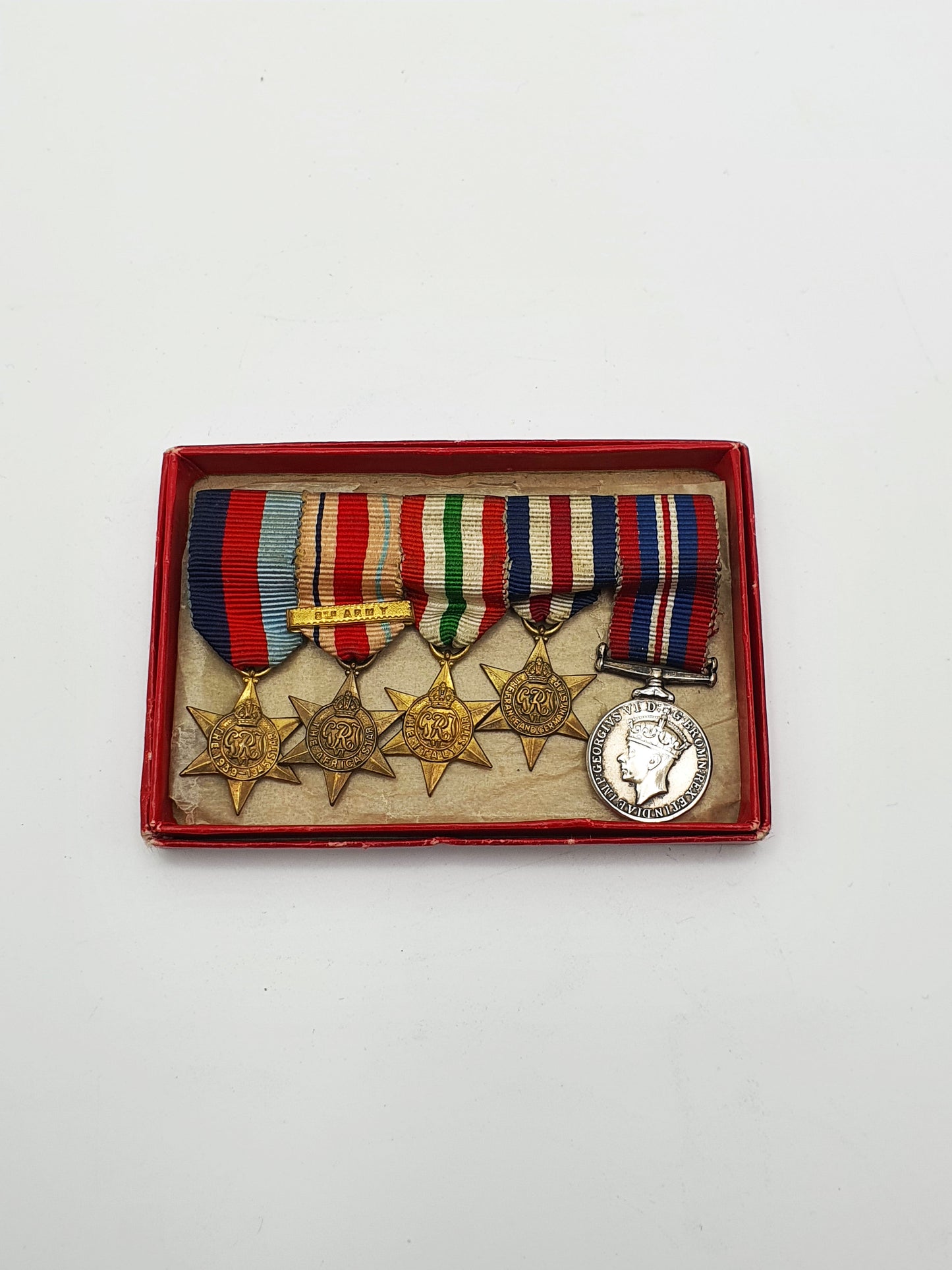 WWII British Miniature Medal Grouping with Four Campaign Stars and War Medal – circa 1945