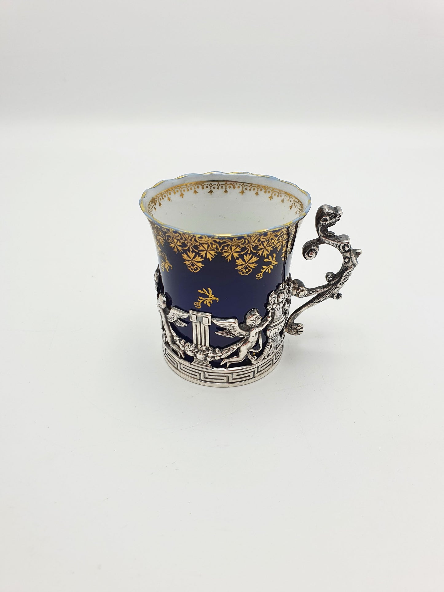 Nice Antique Porcelain and English Silver Coffee Can with Cherub Motif - 1912