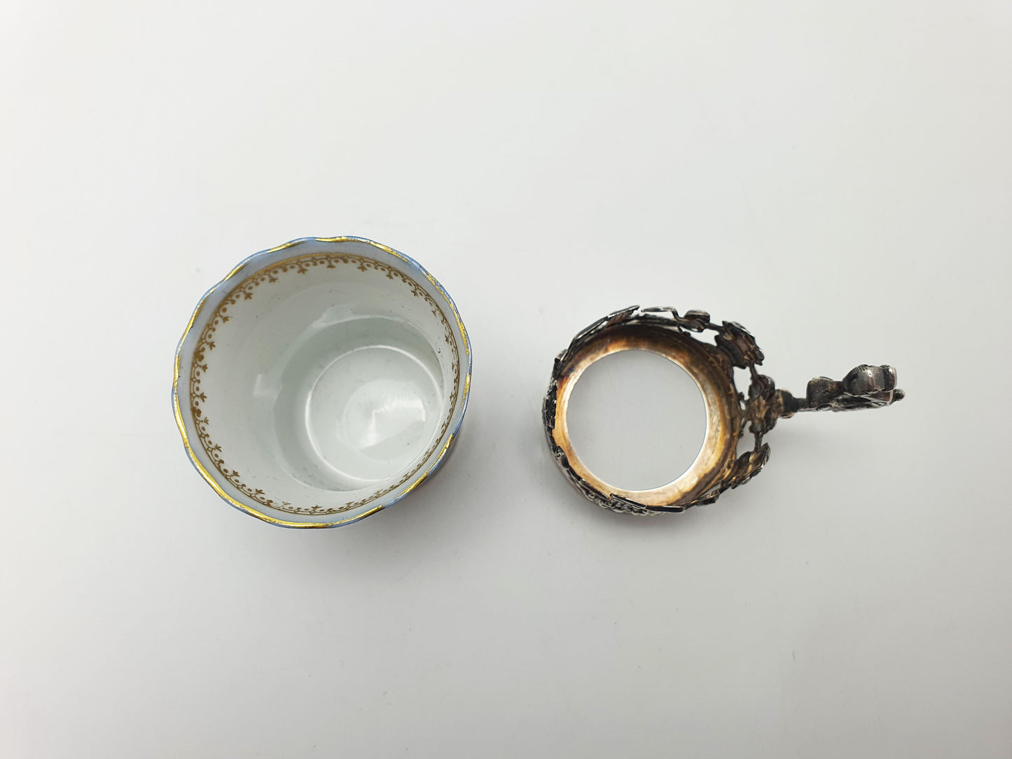 Nice Antique Porcelain and English Silver Coffee Can with Cherub Motif - 1912