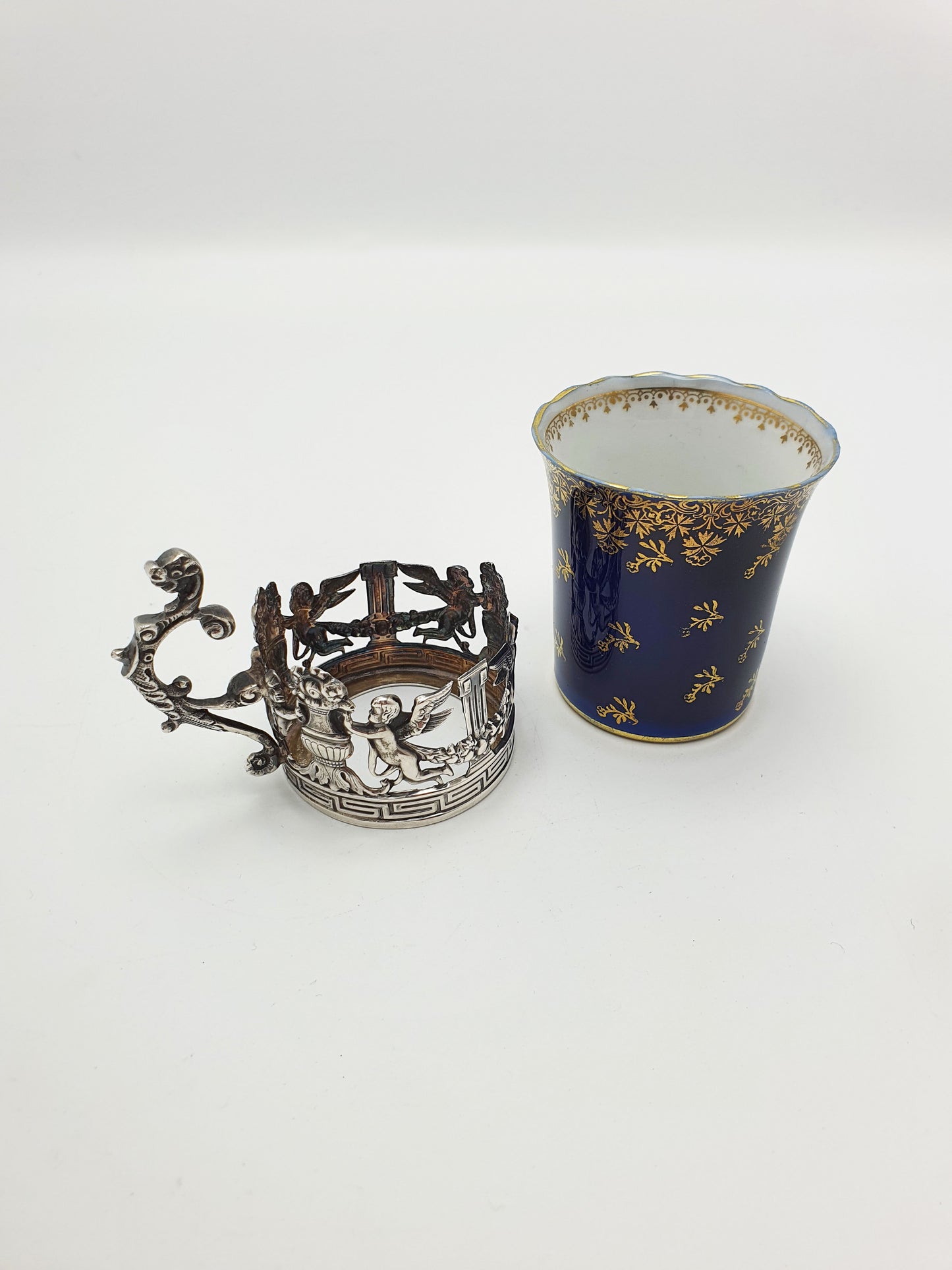 Nice Antique Porcelain and English Silver Coffee Can with Cherub Motif - 1912