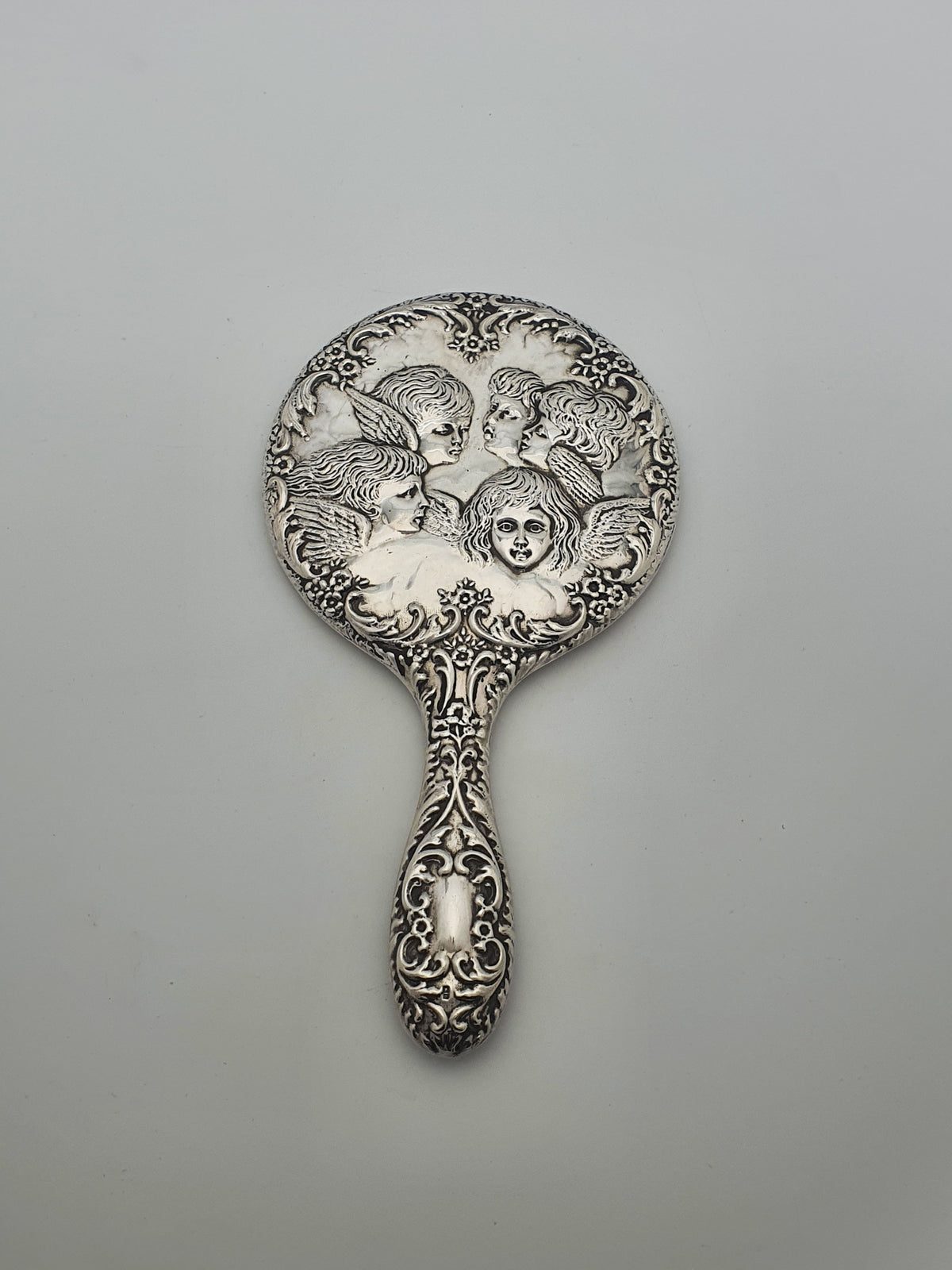 Elizabeth II Sterling Silver Cherub Repoussé Hand Mirror - 1963
