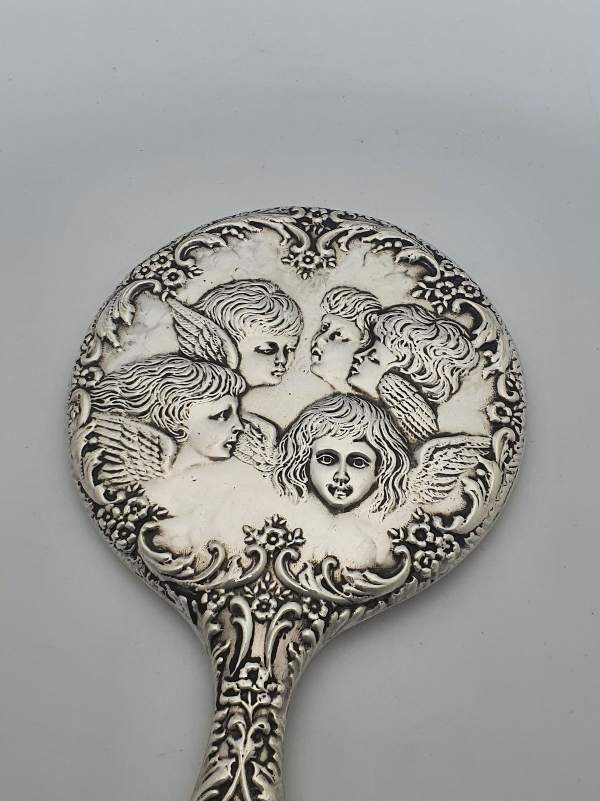 Elizabeth II Sterling Silver Cherub Repoussé Hand Mirror - 1963