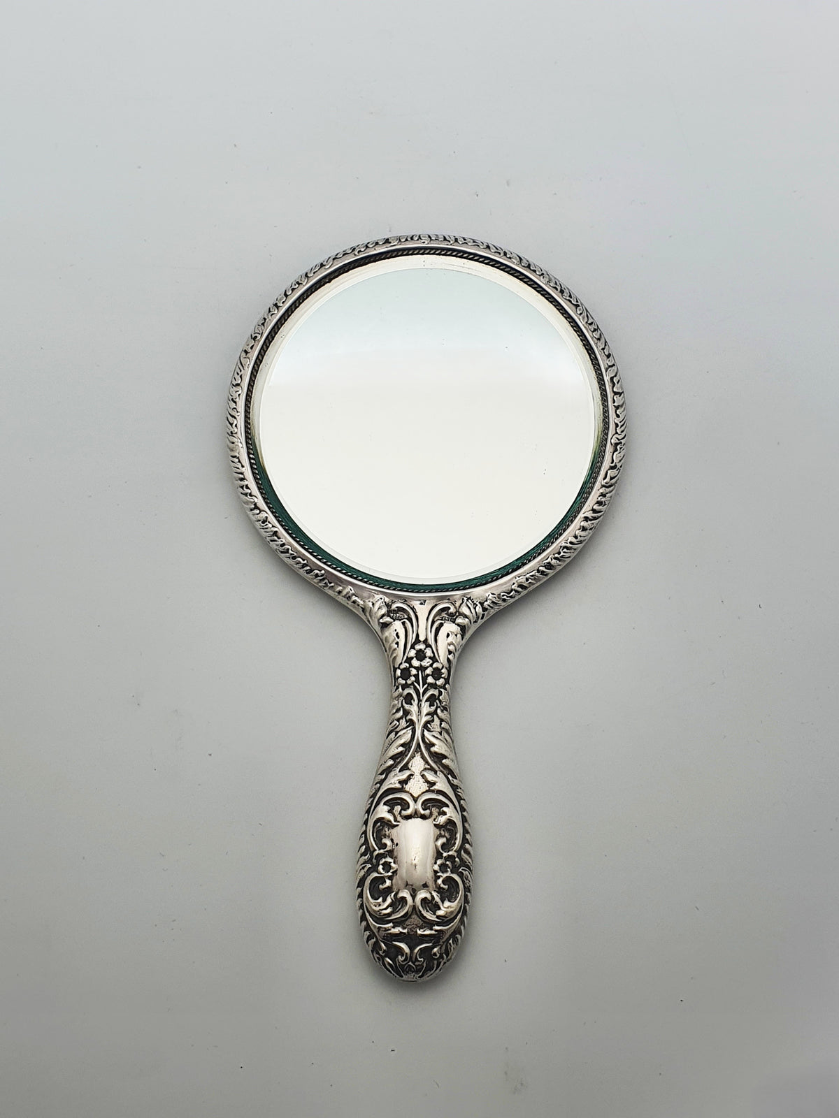 Elizabeth II Sterling Silver Cherub Repoussé Hand Mirror - 1963