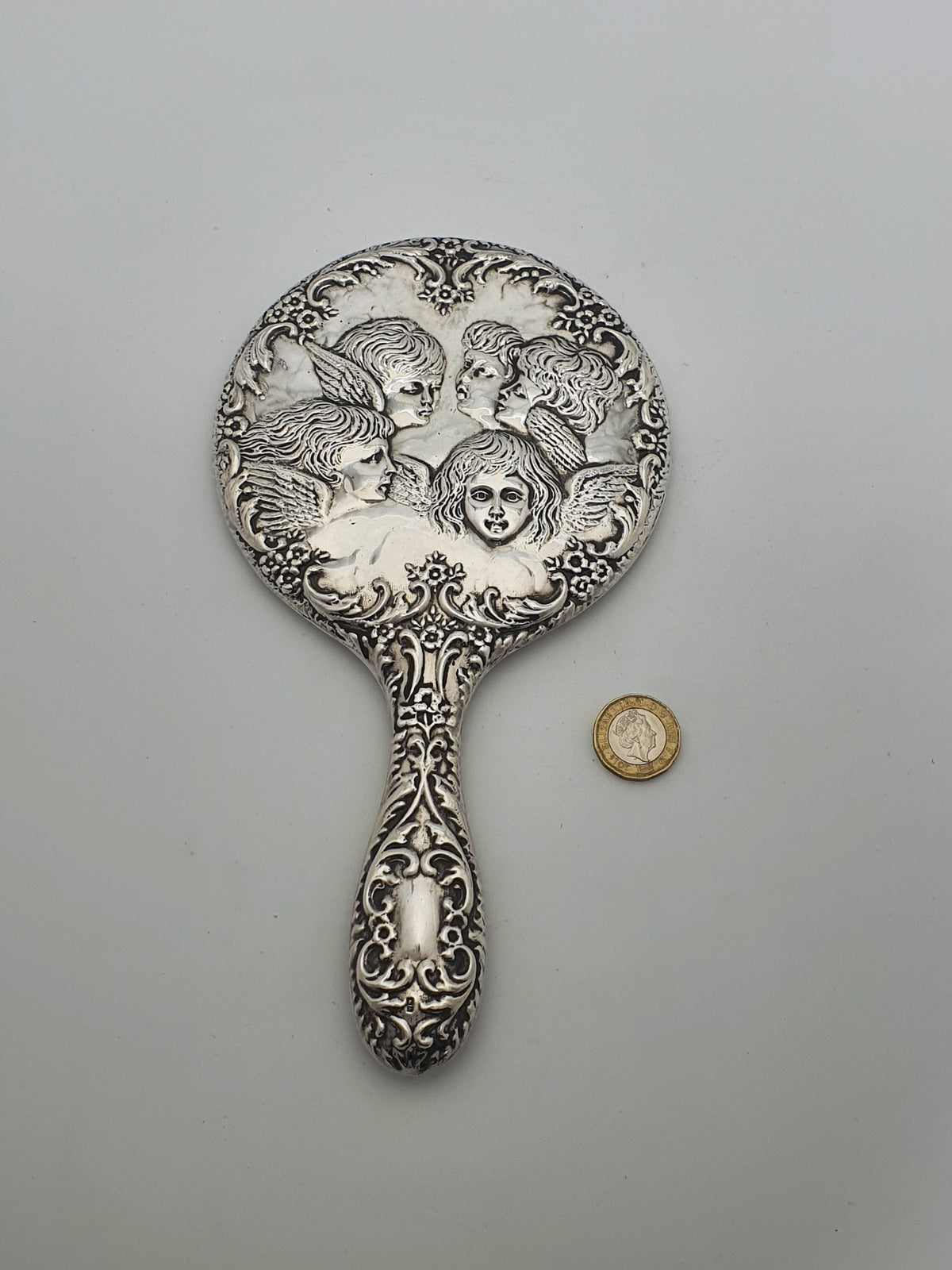 Elizabeth II Sterling Silver Cherub Repoussé Hand Mirror - 1963