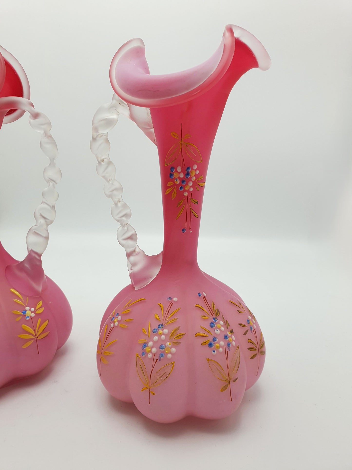 Pair of Victorian Pink Satin Glass Ewers with Enamel Floral Decoration – circa 1890