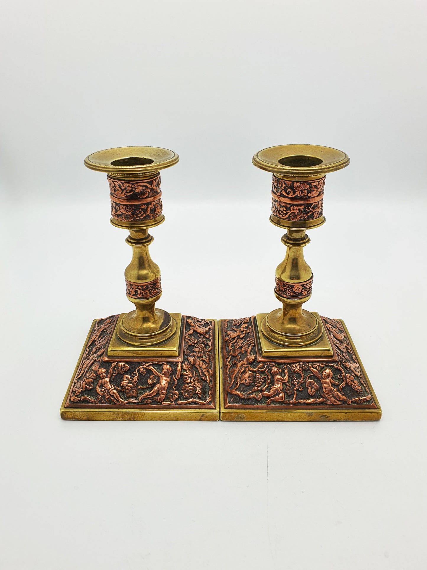 Charming Pair of Antique Edwardian Brass & Copper Repoussé Candlesticks – circa 1905