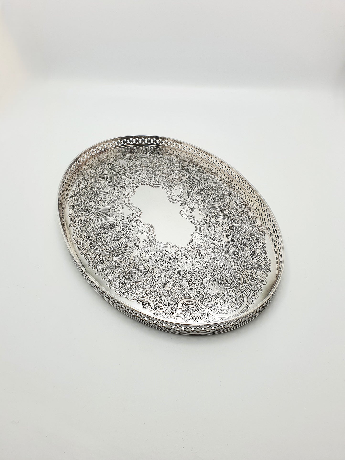 Nice Silver Plated Oval Serving Tray with Intricate Embossed Scrolls – circa 1930