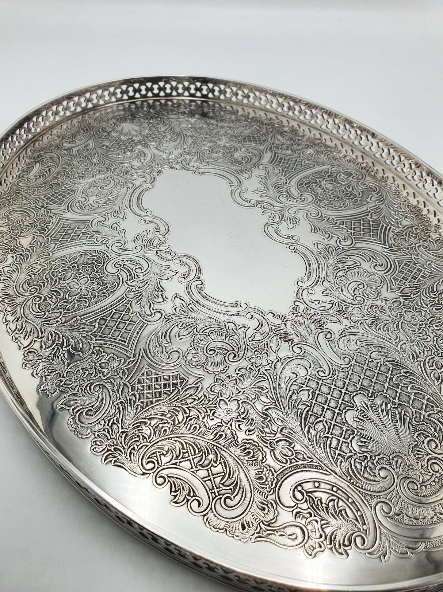 Nice Silver Plated Oval Serving Tray with Intricate Embossed Scrolls – circa 1930