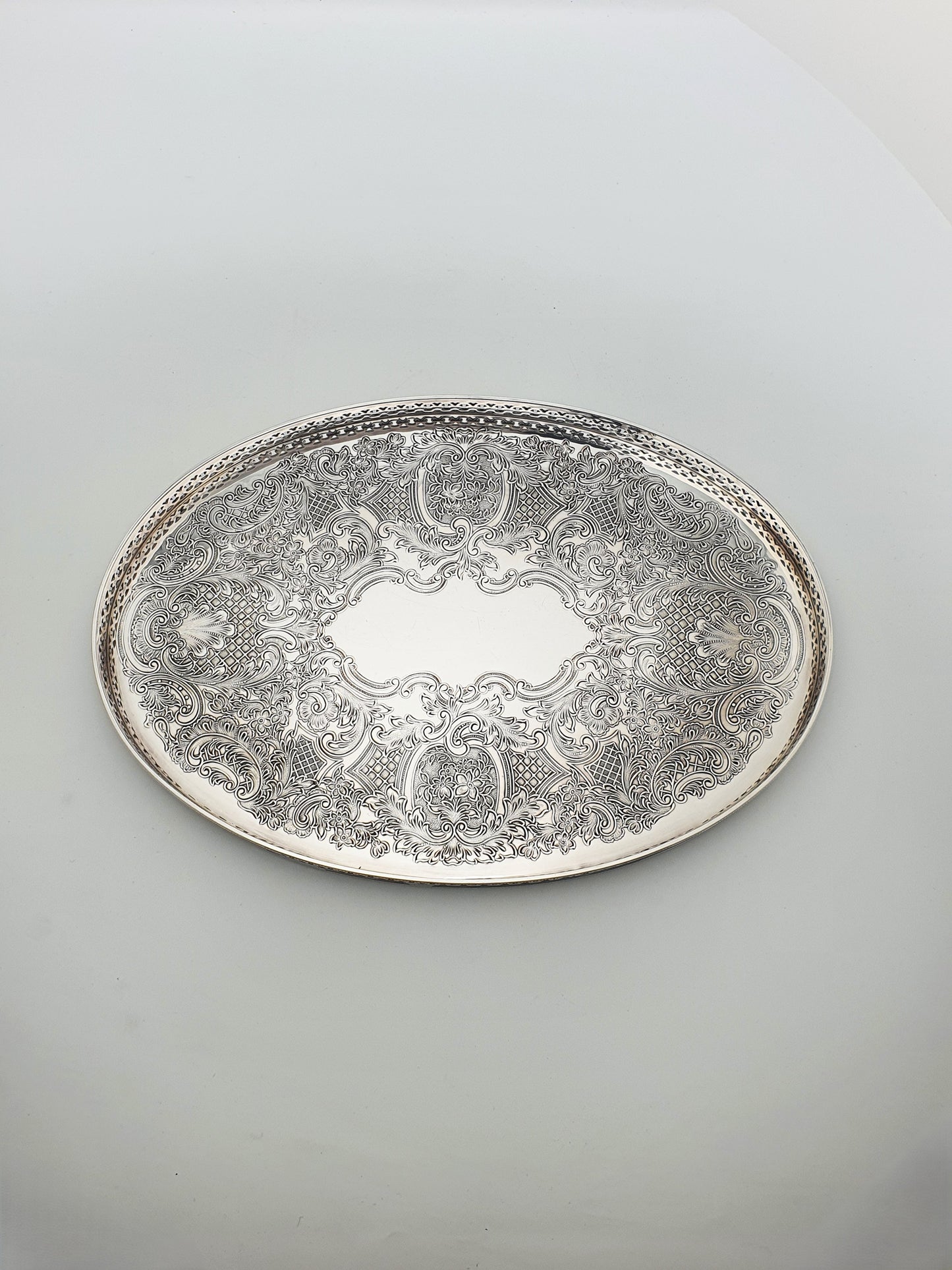 Nice Silver Plated Oval Serving Tray with Intricate Embossed Scrolls – circa 1930