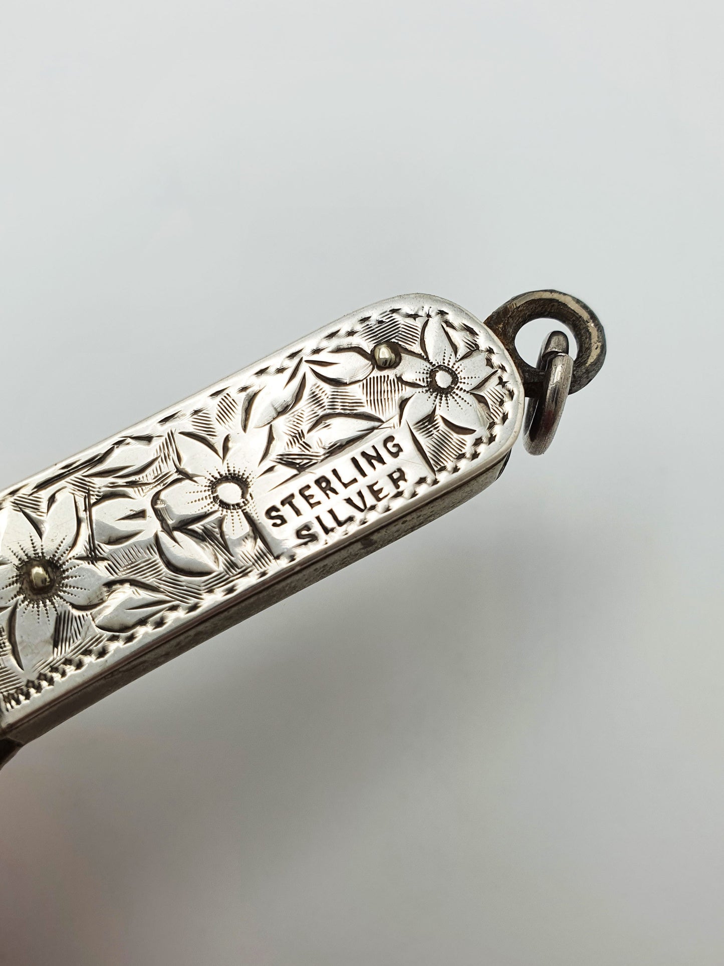 Nice Small Antique Sterling Silver Floral-Engraved Cigar Cutter – circa 1900