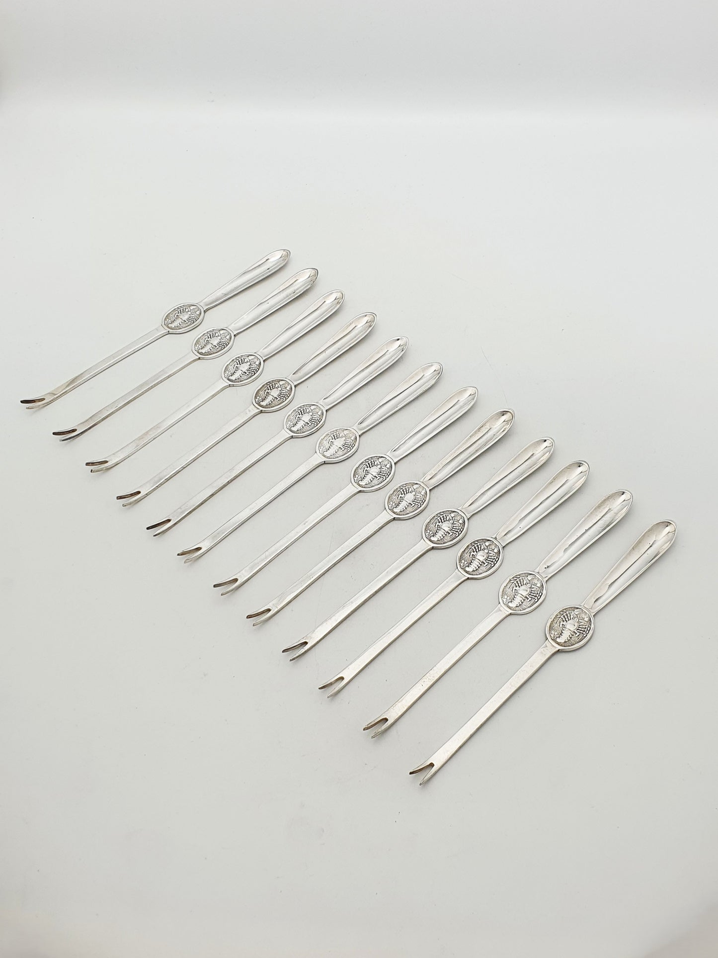 Antique Silver Plated Lobster Picks Set Of 12 With Lobster Medallion Handles – circa 1920