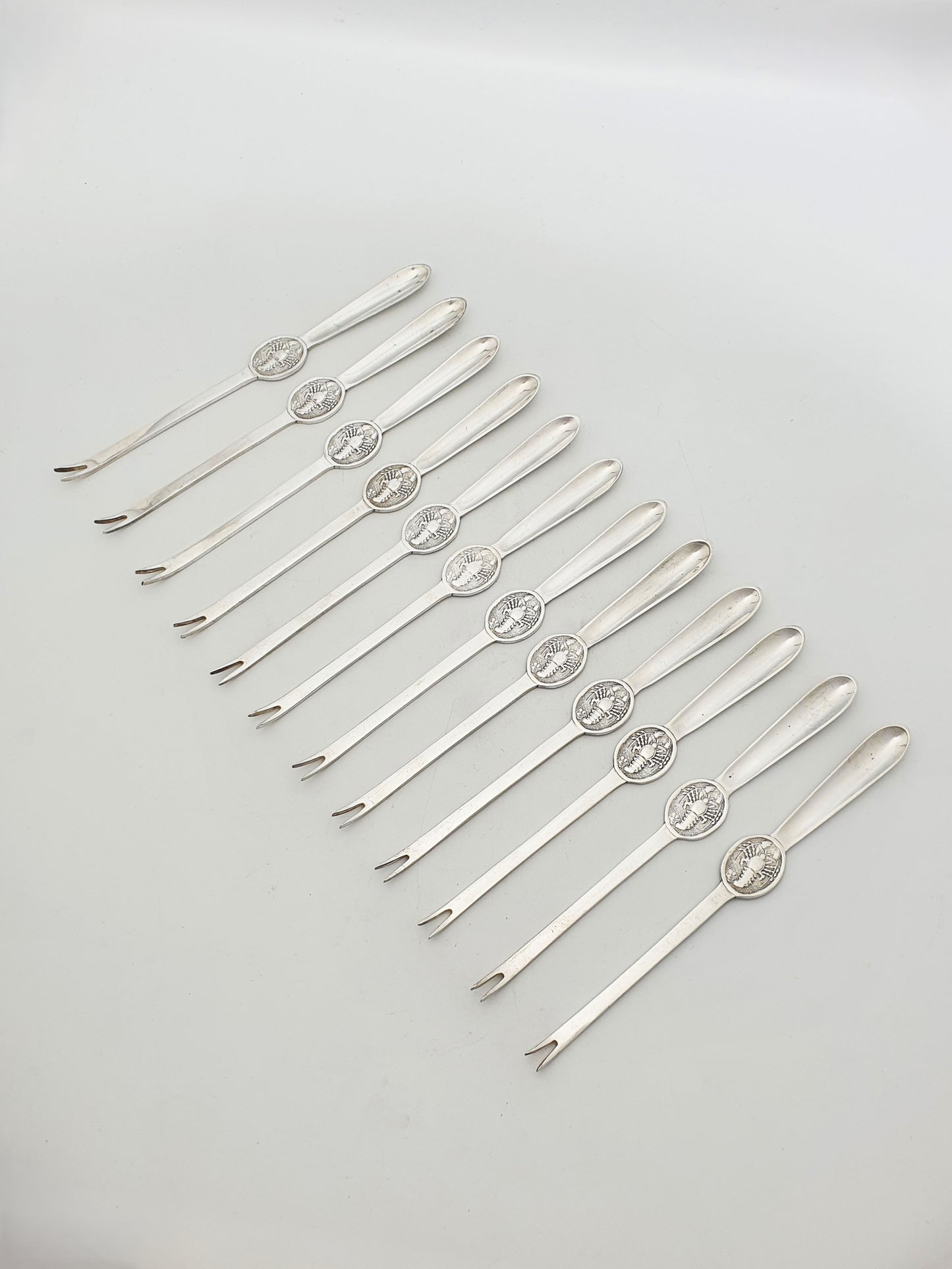 Antique Silver Plated Lobster Picks Set Of 12 With Lobster Medallion Handles – circa 1920