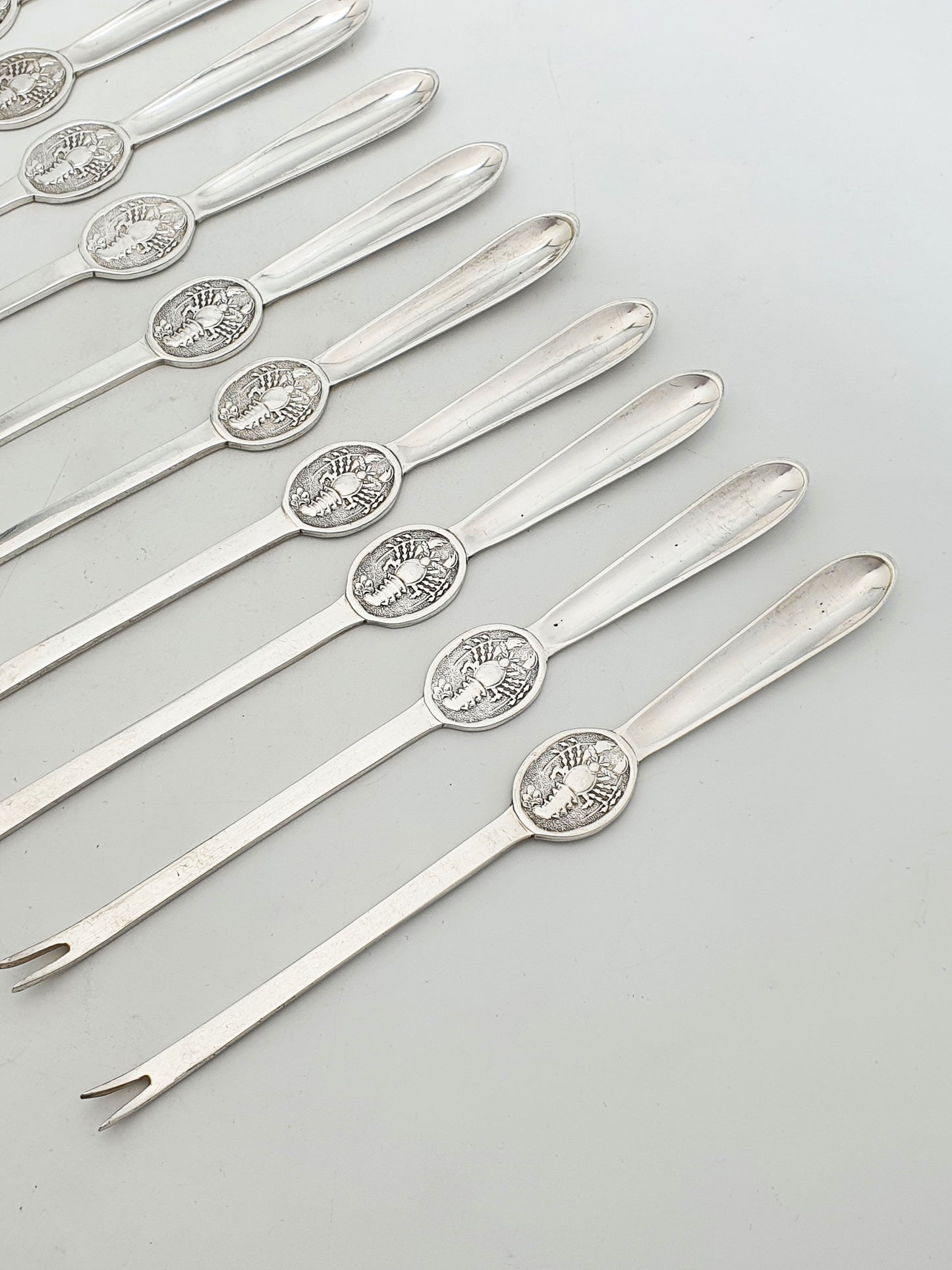 Antique Silver Plated Lobster Picks Set Of 12 With Lobster Medallion Handles – circa 1920