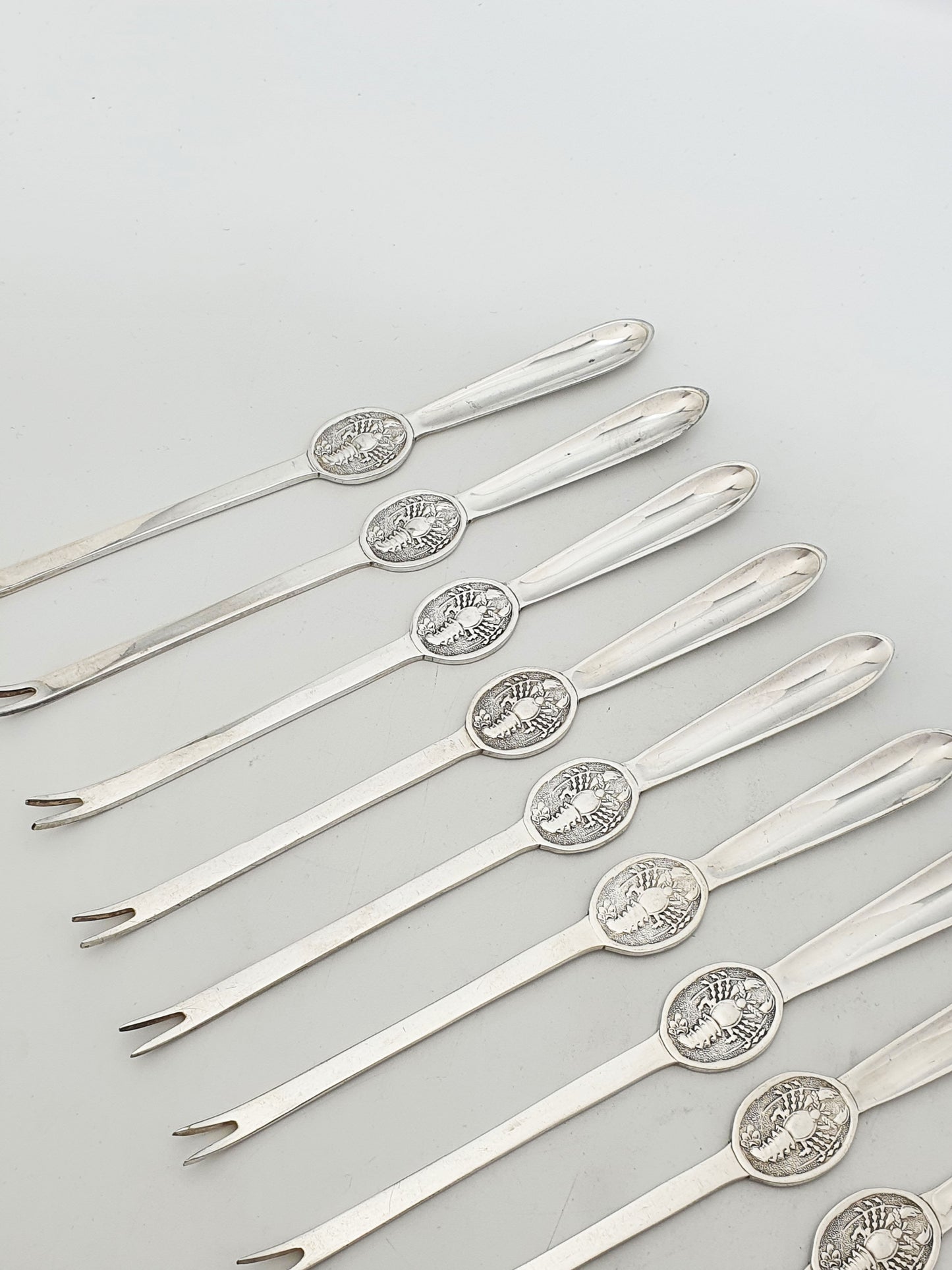 Antique Silver Plated Lobster Picks Set Of 12 With Lobster Medallion Handles – circa 1920