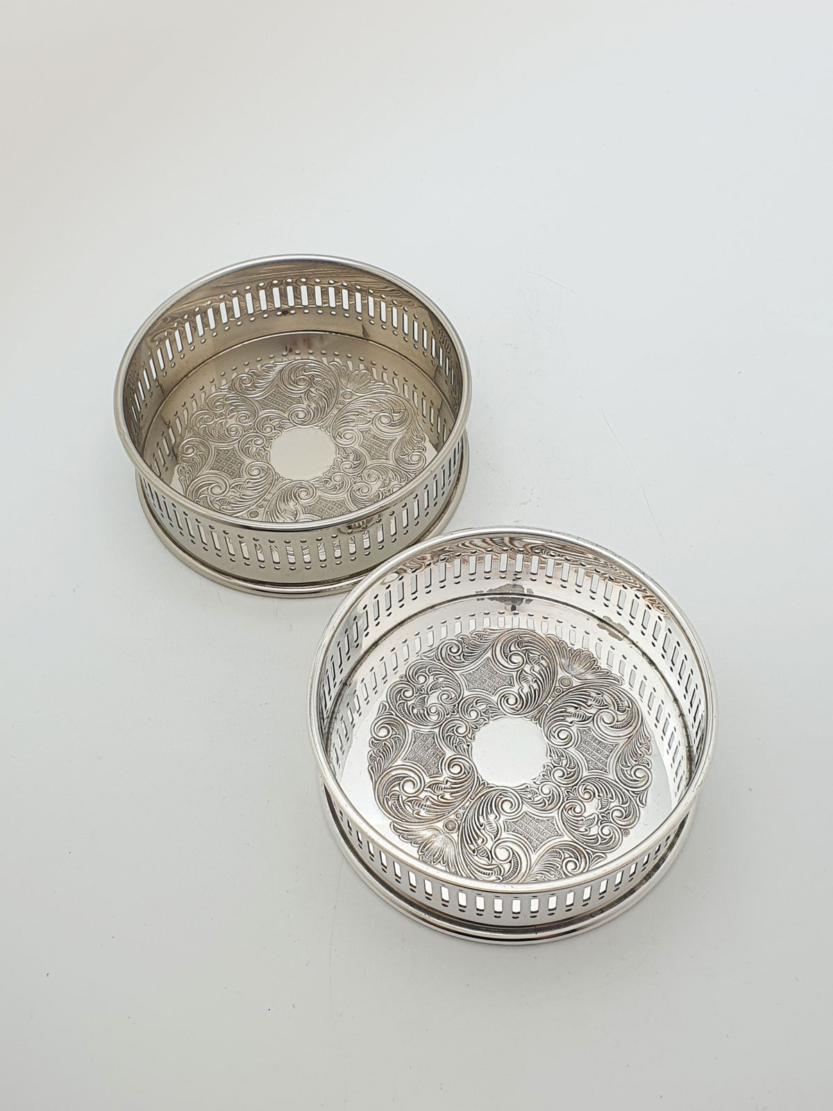 Pair of Vintage Silver Plated Embossed Wine Bottle Coasters – circa 1960