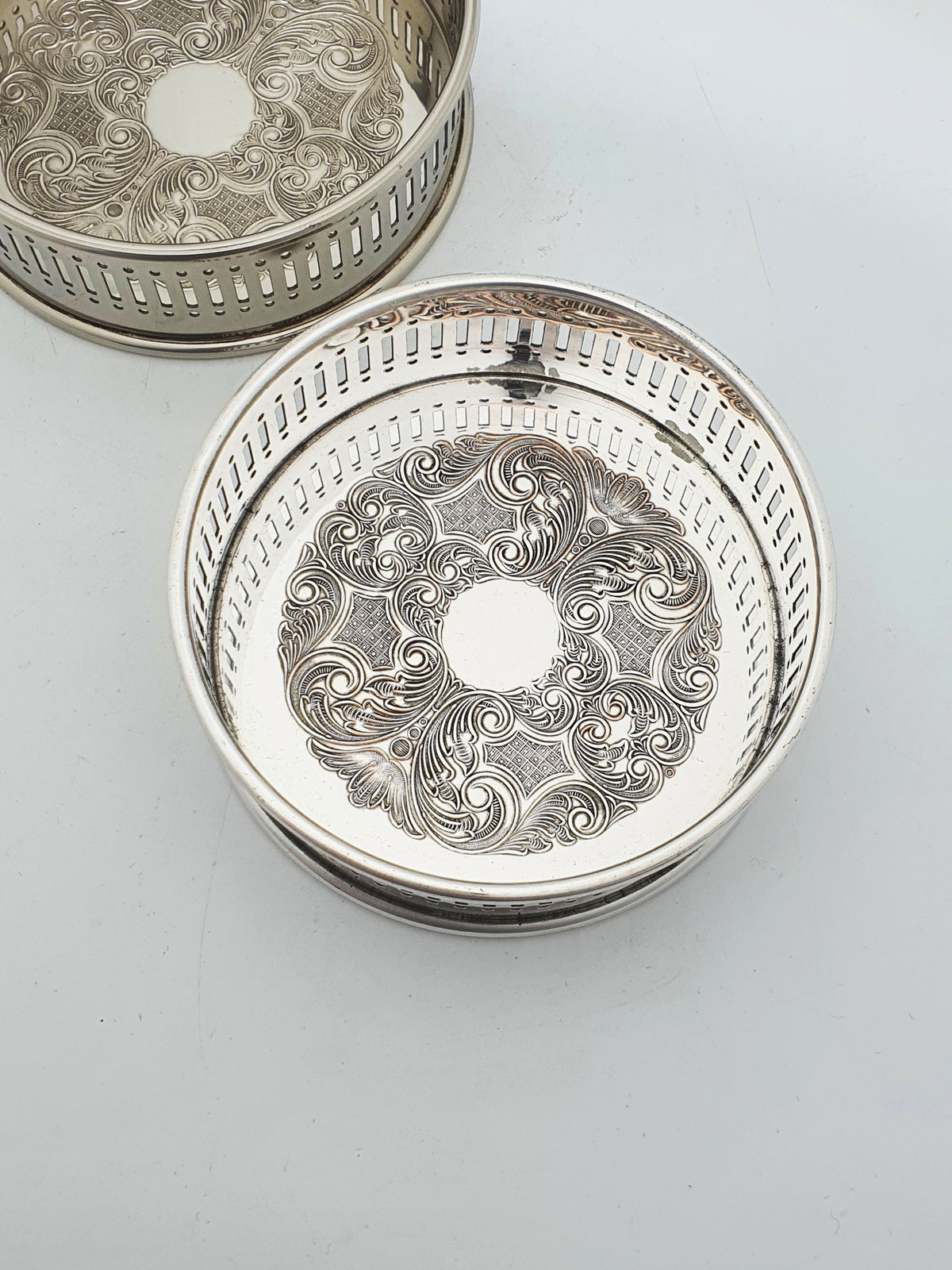 Pair of Vintage Silver Plated Embossed Wine Bottle Coasters – circa 1960