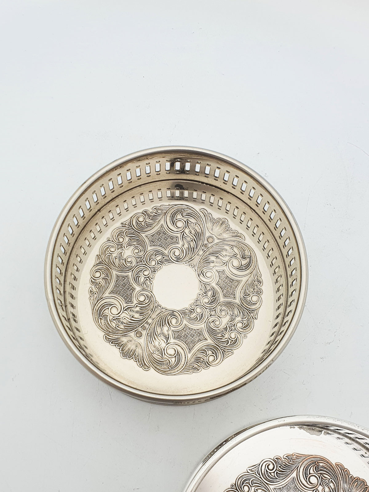 Pair of Vintage Silver Plated Embossed Wine Bottle Coasters – circa 1960