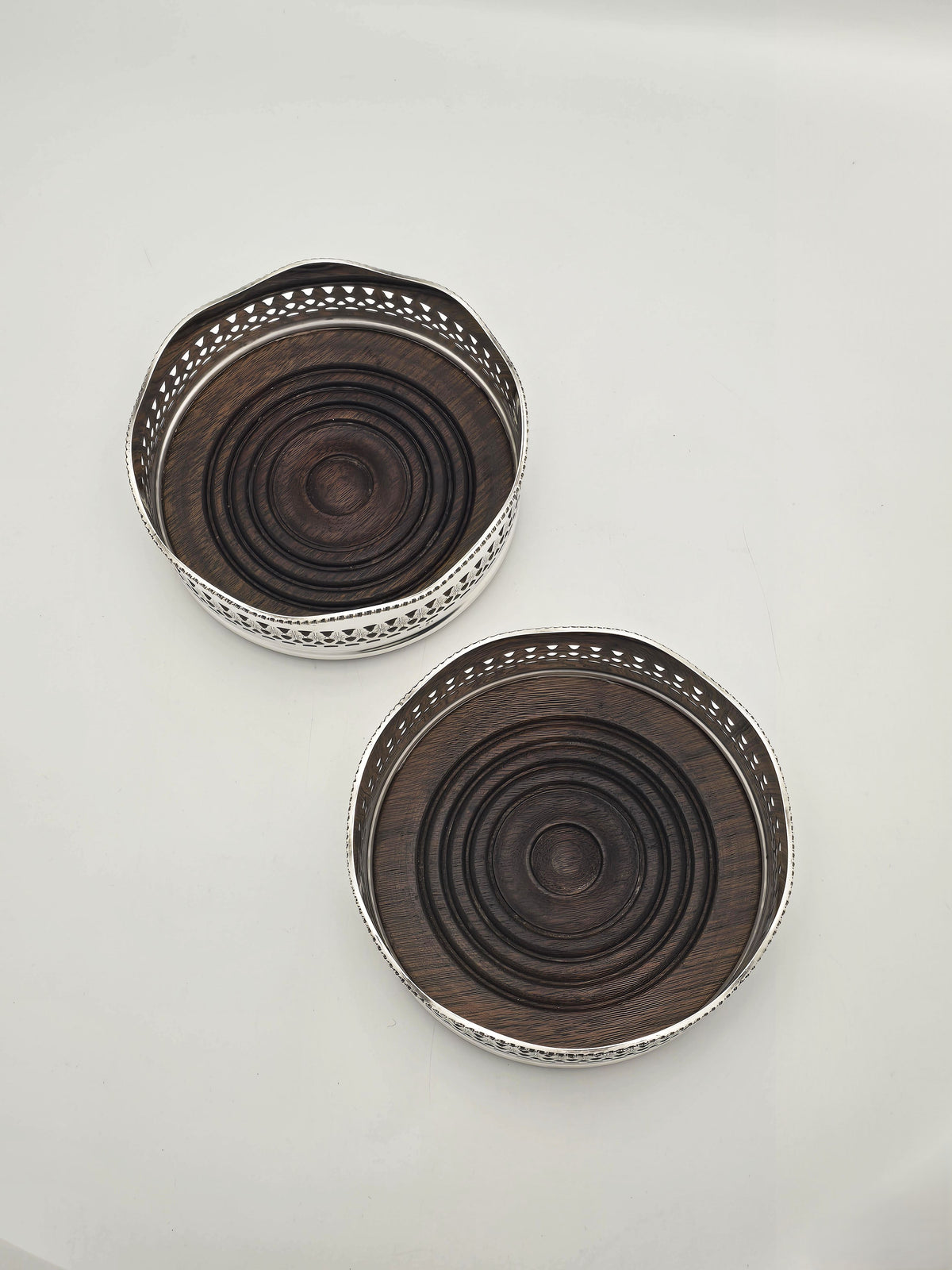 Antique Silver Plated and Mahogany Pierced Wine Bottle Coasters circa 1920