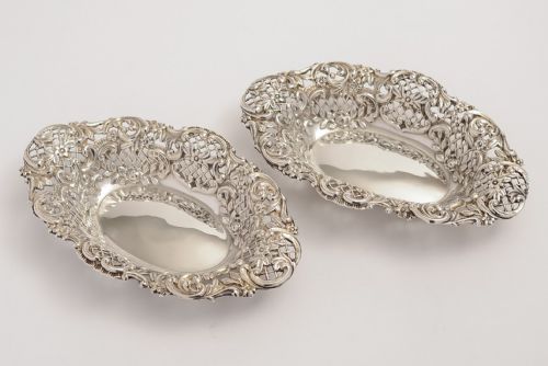 Pair of sterling silver bon bon dishes.
