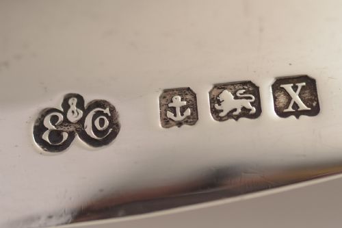 Pair of Silver Elkington arts and crafts style salad servers.