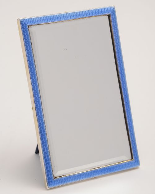 Silver and blue Guilloche enamel mirror.
