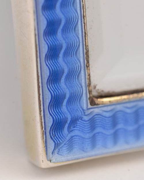 Silver and blue Guilloche enamel mirror.