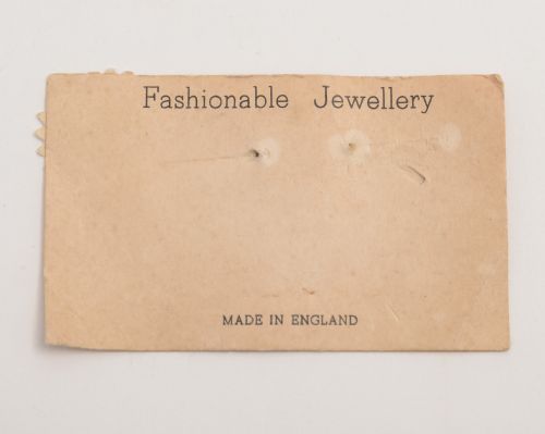 Collection of four enamel brooches.