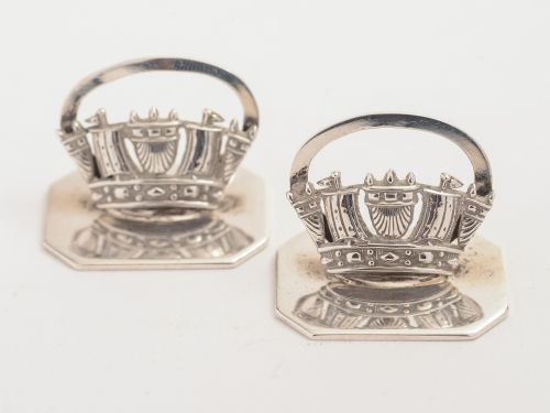 Pair of Royal Naval Silver menu/place setting holders