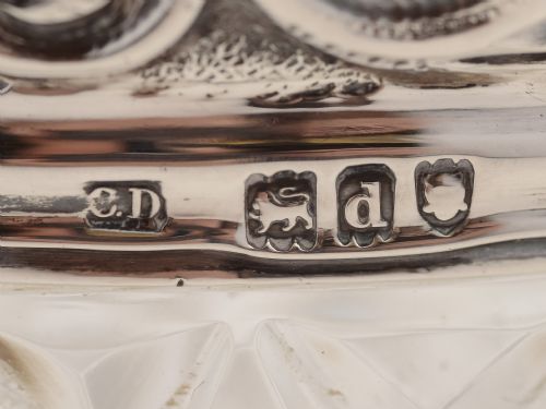 Victorian silver topped cut glass jar.