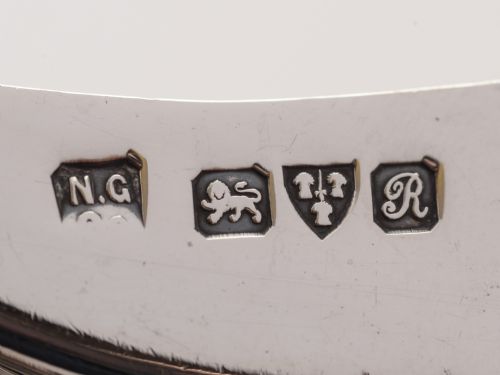 Silver shell shaped butter dish with matching knife