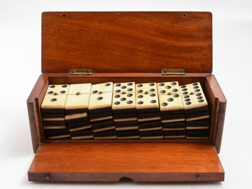 Mahogany boxed bone and ebony dominoes set