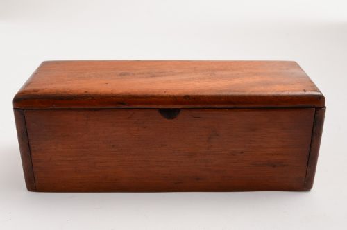 Mahogany boxed bone and ebony dominoes set