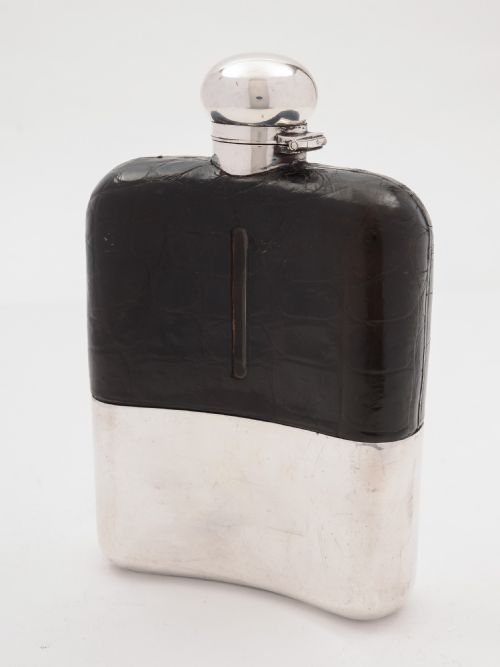 A large Edwardian crocodile leather hip flask