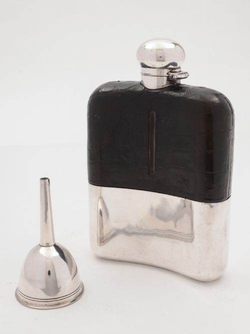 A large Edwardian crocodile leather hip flask
