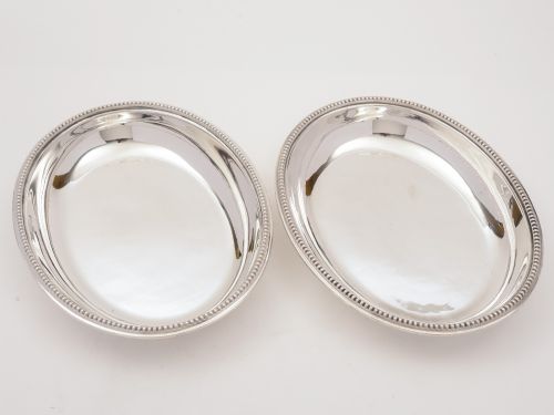 A matched pair of Victorian silver plated entrée dishes by Hukin & Heath circa 1890