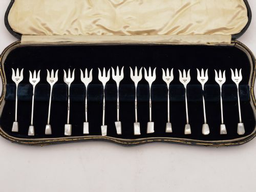 Cased Matched Set of 14 Silver Hors d'oeuvres Forks Sheffield 