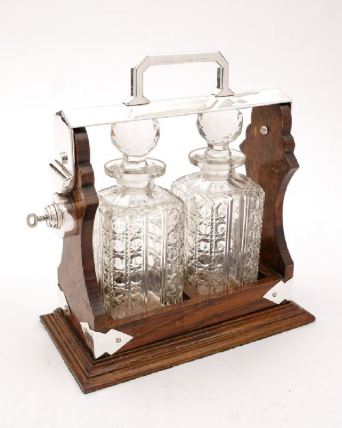 Lovely Victorian oak 2 bottle tantalus - circa 1890
