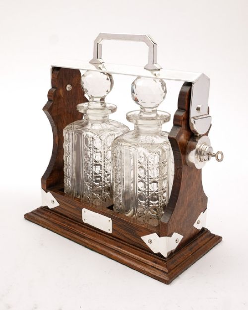 Lovely Victorian oak 2 bottle tantalus - circa 1890